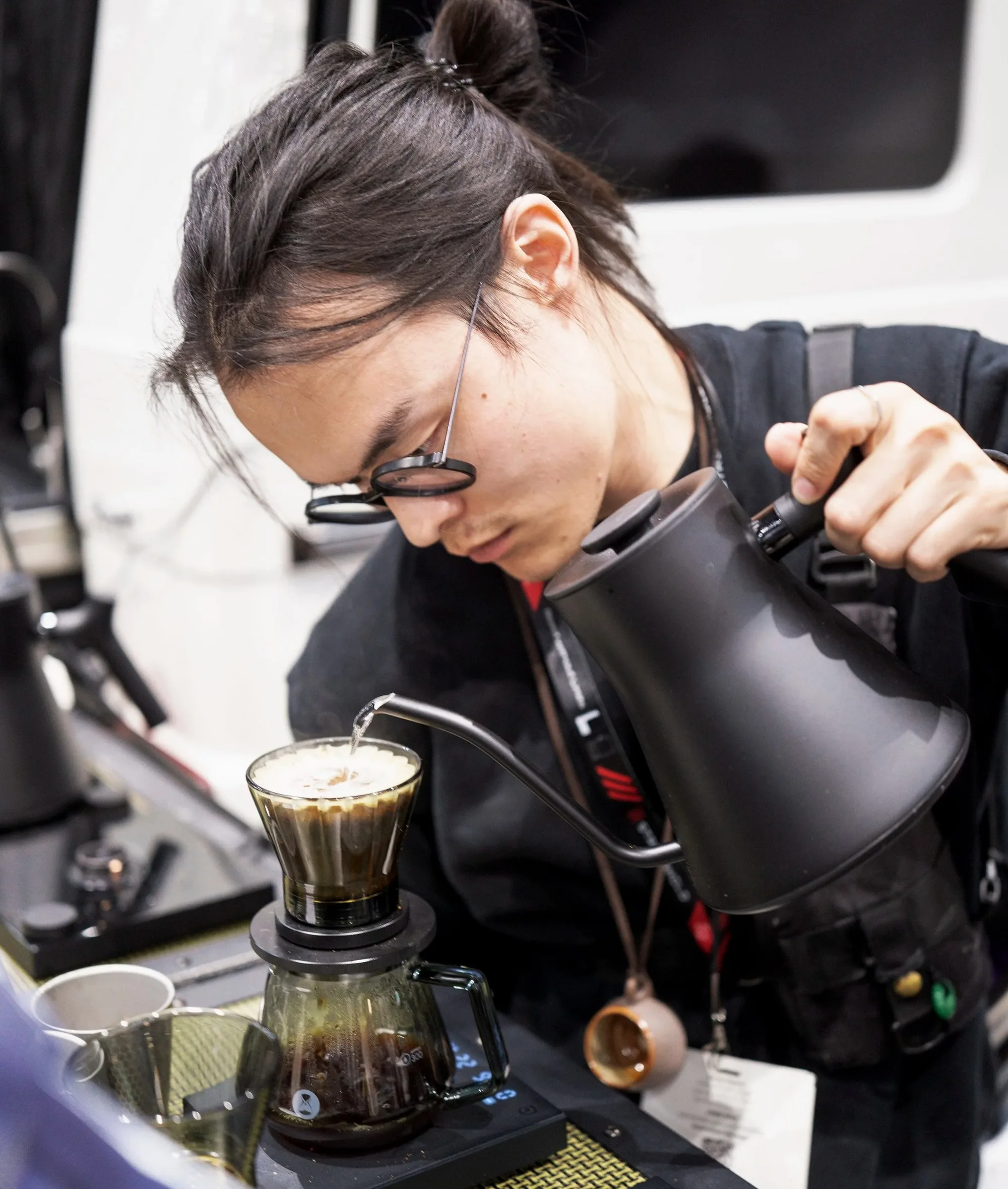 Kieran brewing at World of Coffee San Diego 2026