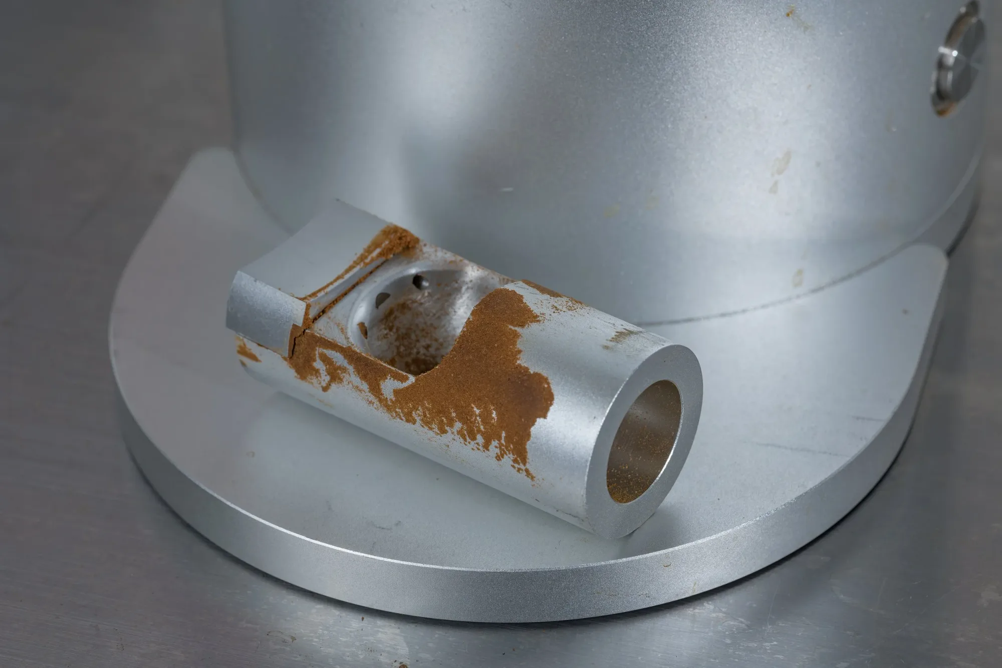 A spro-heavy diet, knocking while running, and a poorly seated chute will collect more